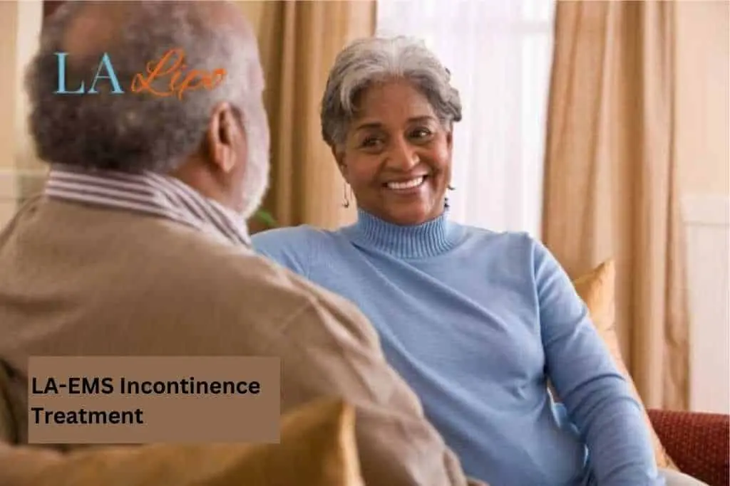 Couple sat smiling at each other - LA-EMS treatment Chessington