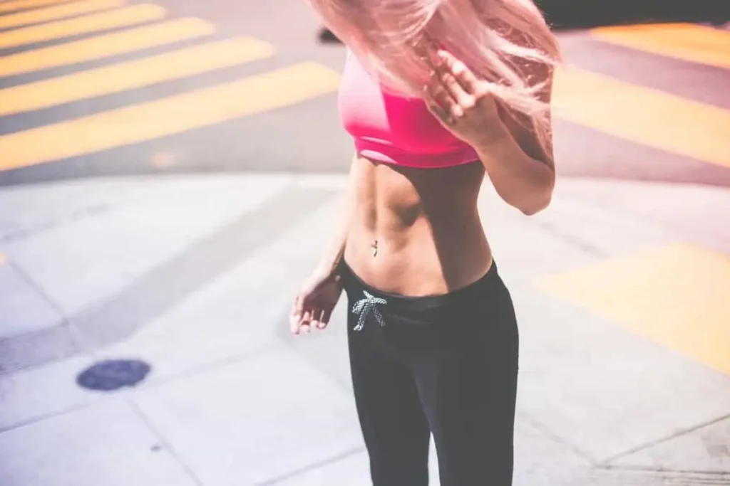 Woman with toned stomach after LA-EMS Body Sculpting Treatment Chessington